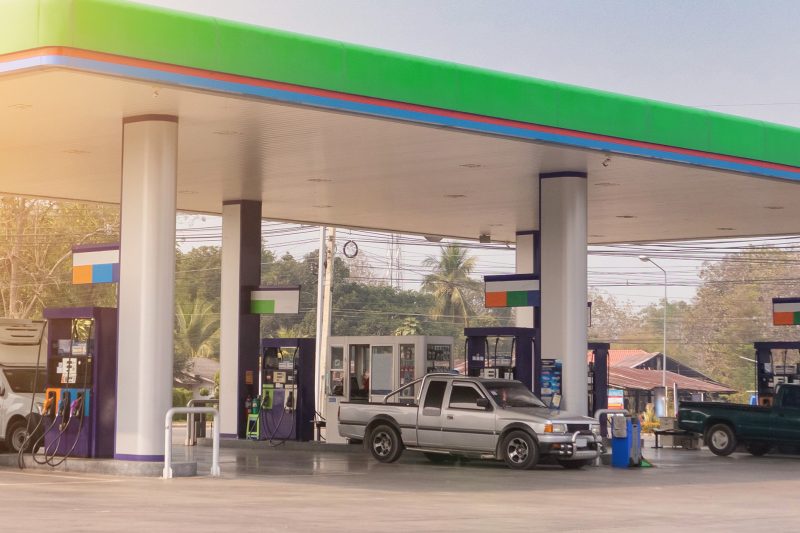 Gas fuel station with clouds sky and sun light